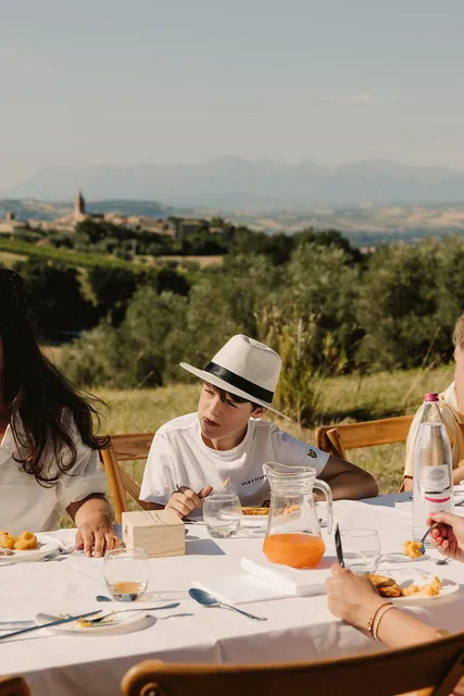 Breakfast at a table in the olive grove