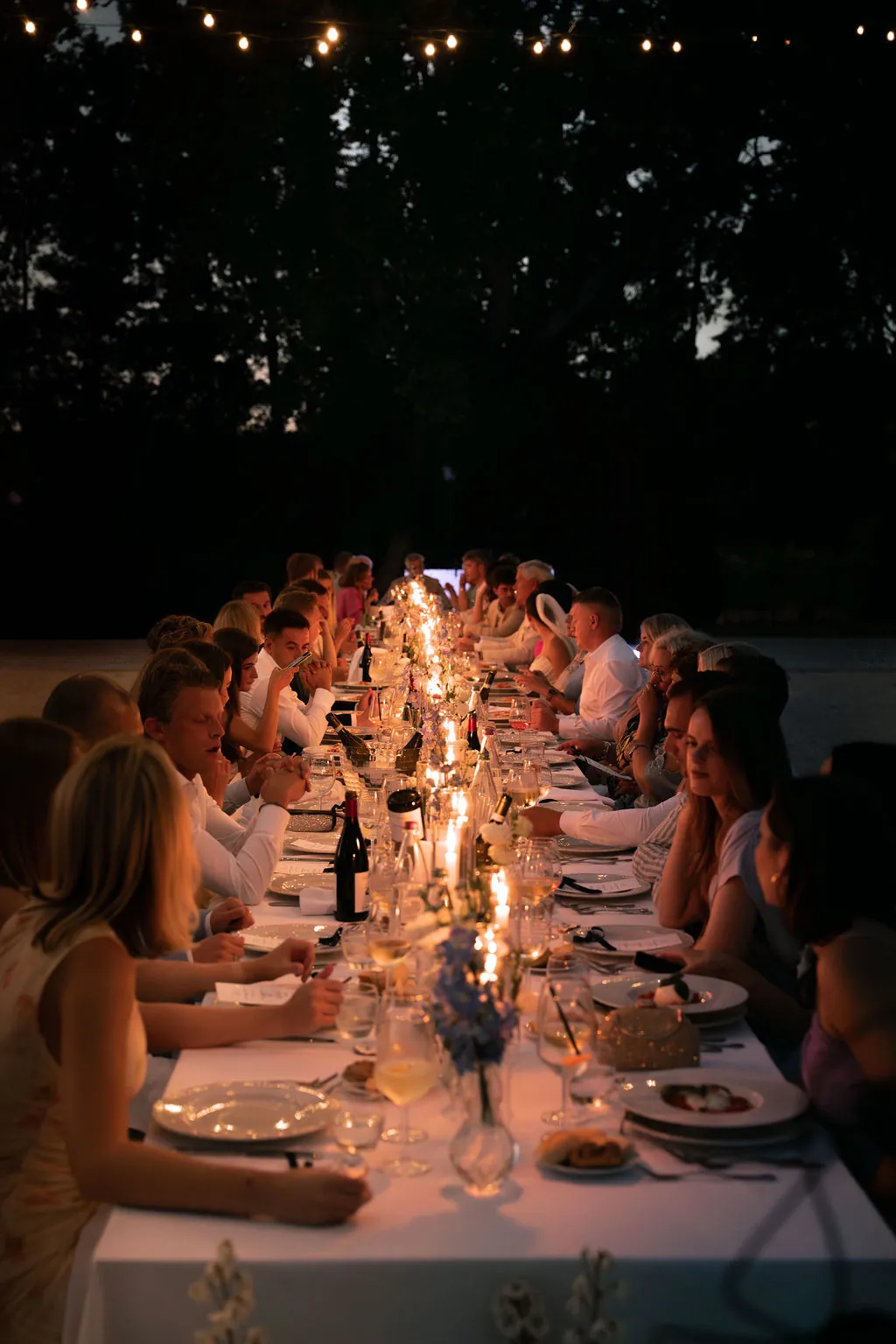 Candlelit wedding dinner at night